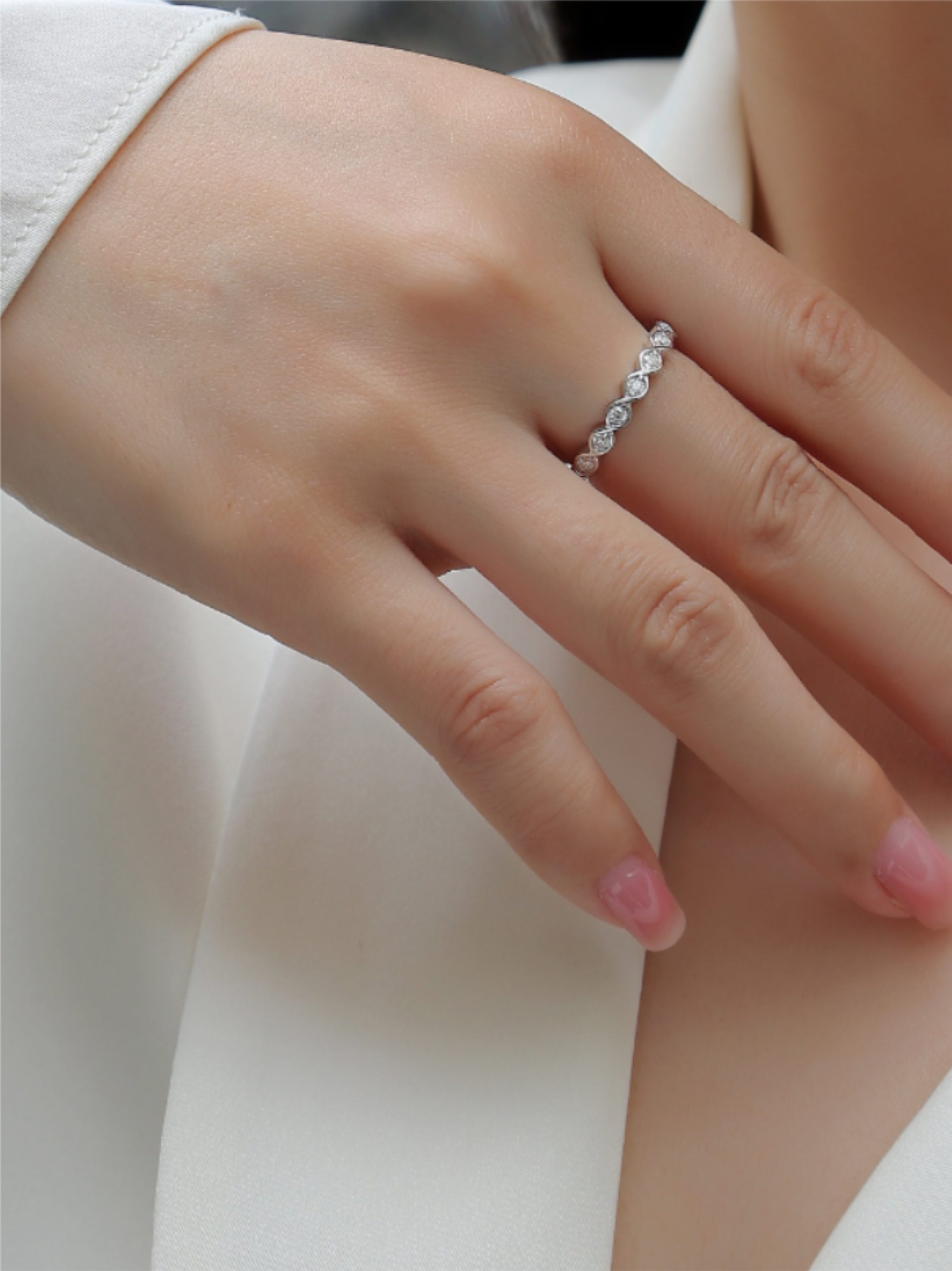 Elegant Twisted Band Moissanite Ring