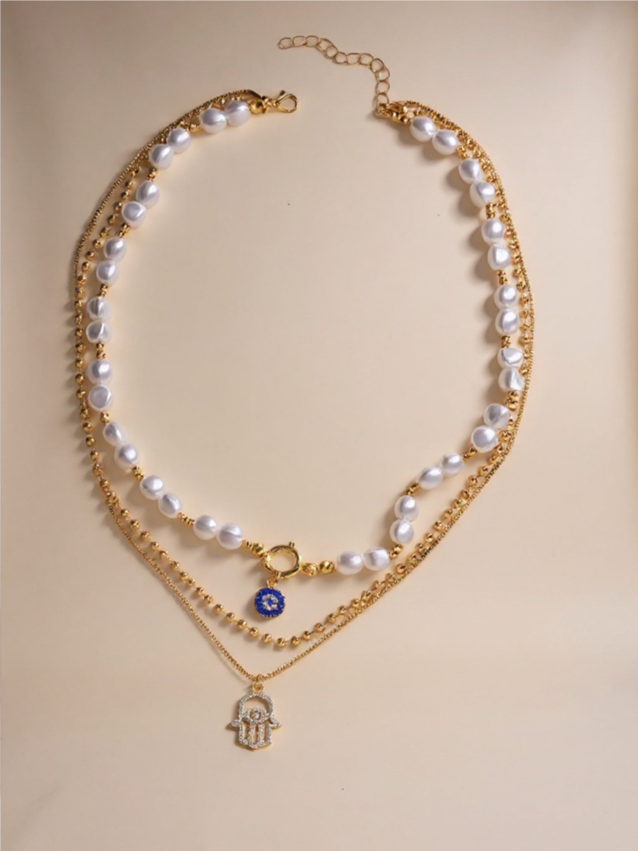 Layered Pearl, Evil Eye & Hamsa Gold Necklace
