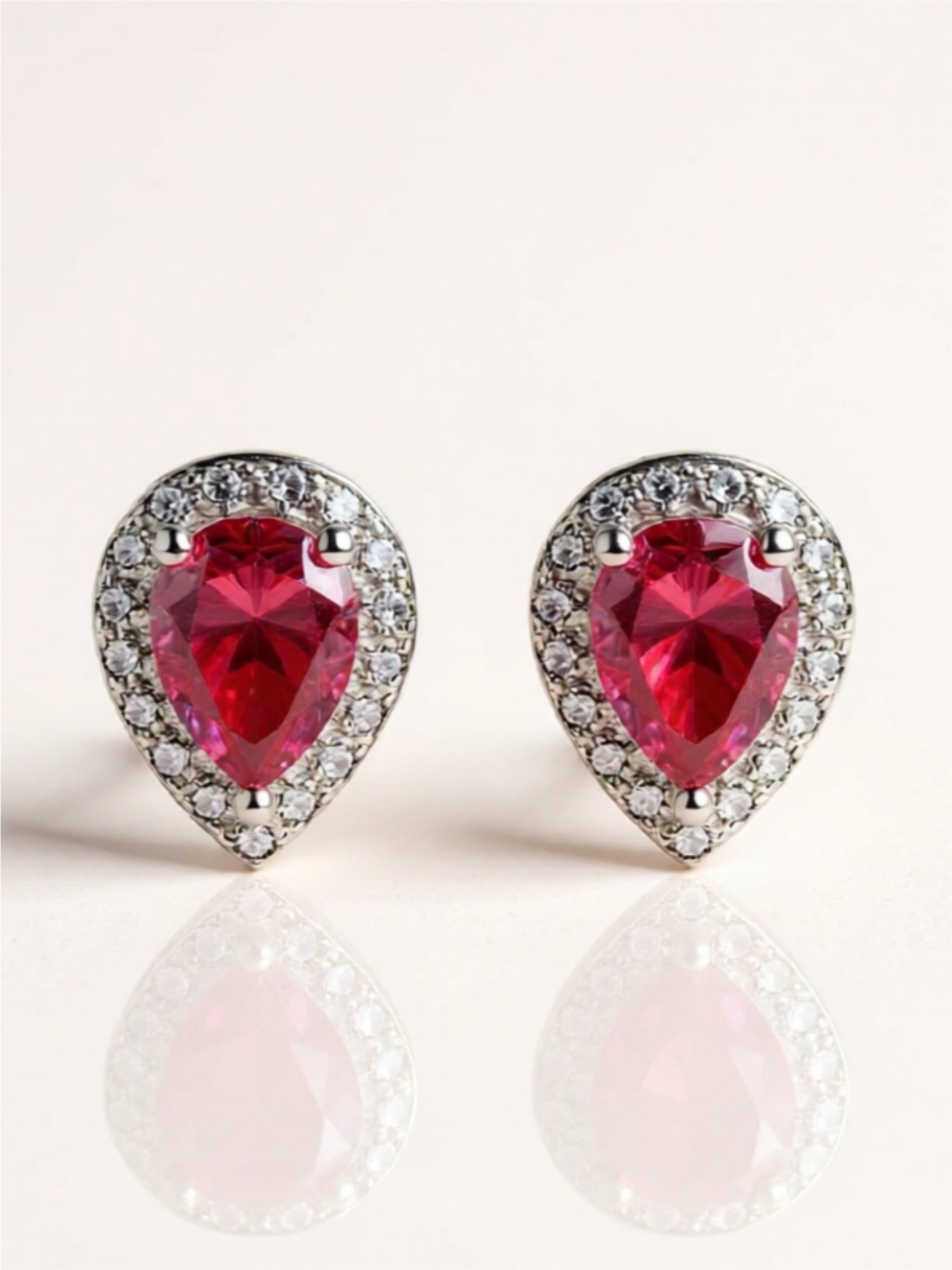 2 Carat Moissanite Teardrop Stud Earrings in Rose