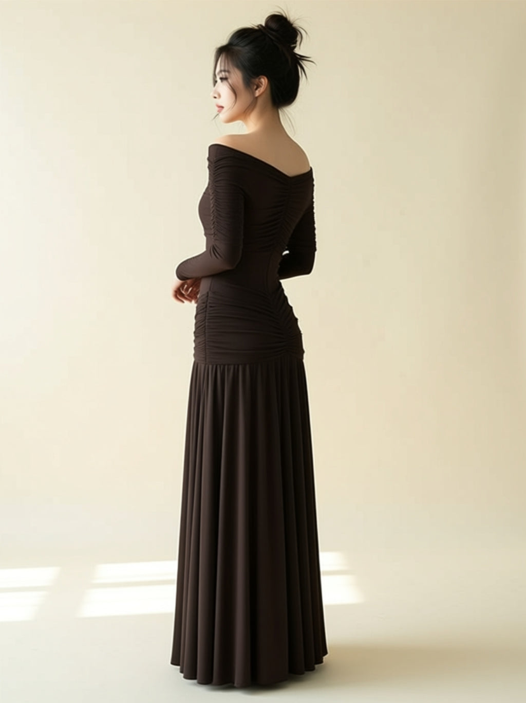 Elegant Off‑Shoulder Draped Maxi Gown