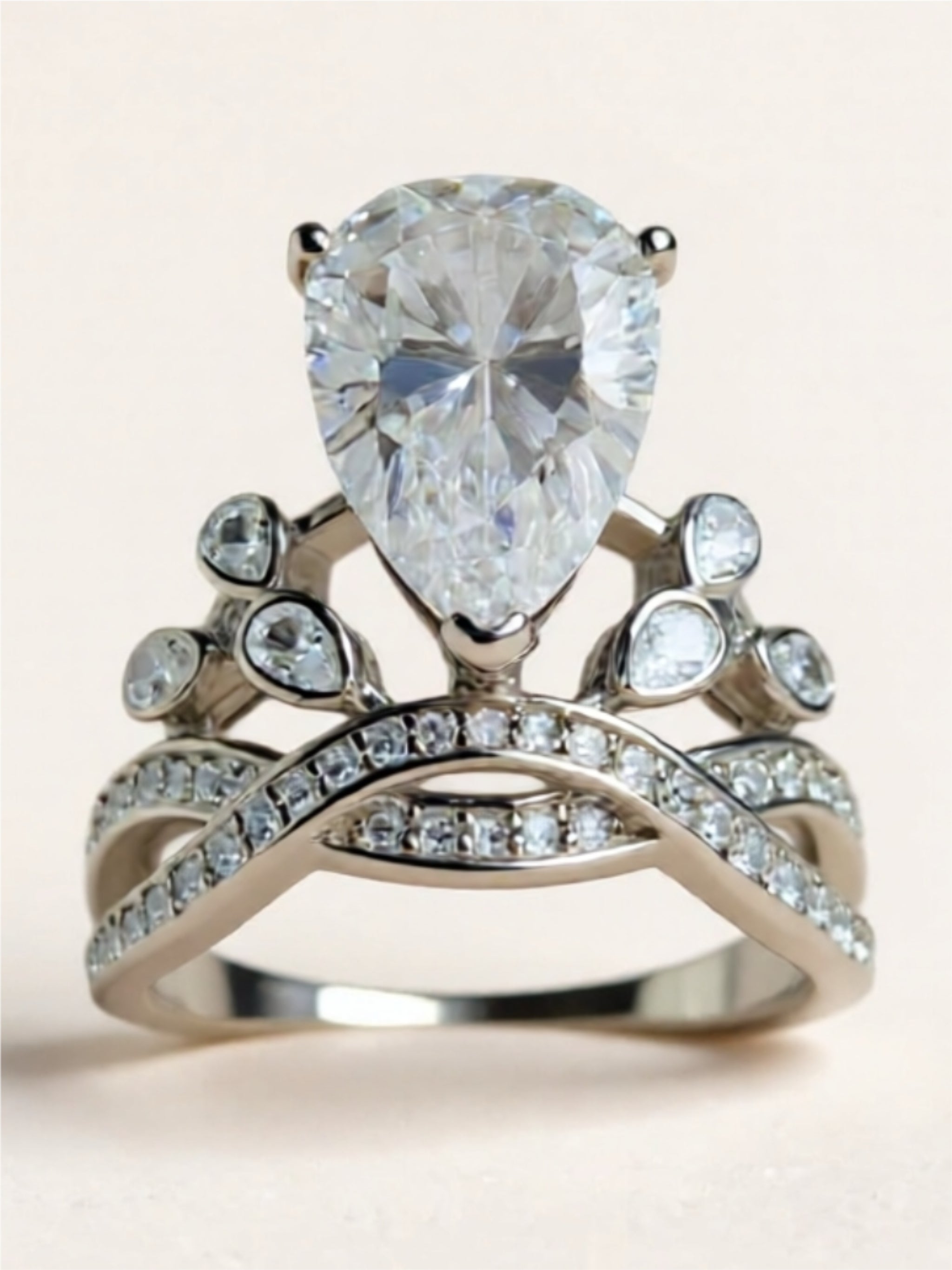 Sterling Silver Ring with 5-Carat Pear-Shaped Moissanite & CZ Accents