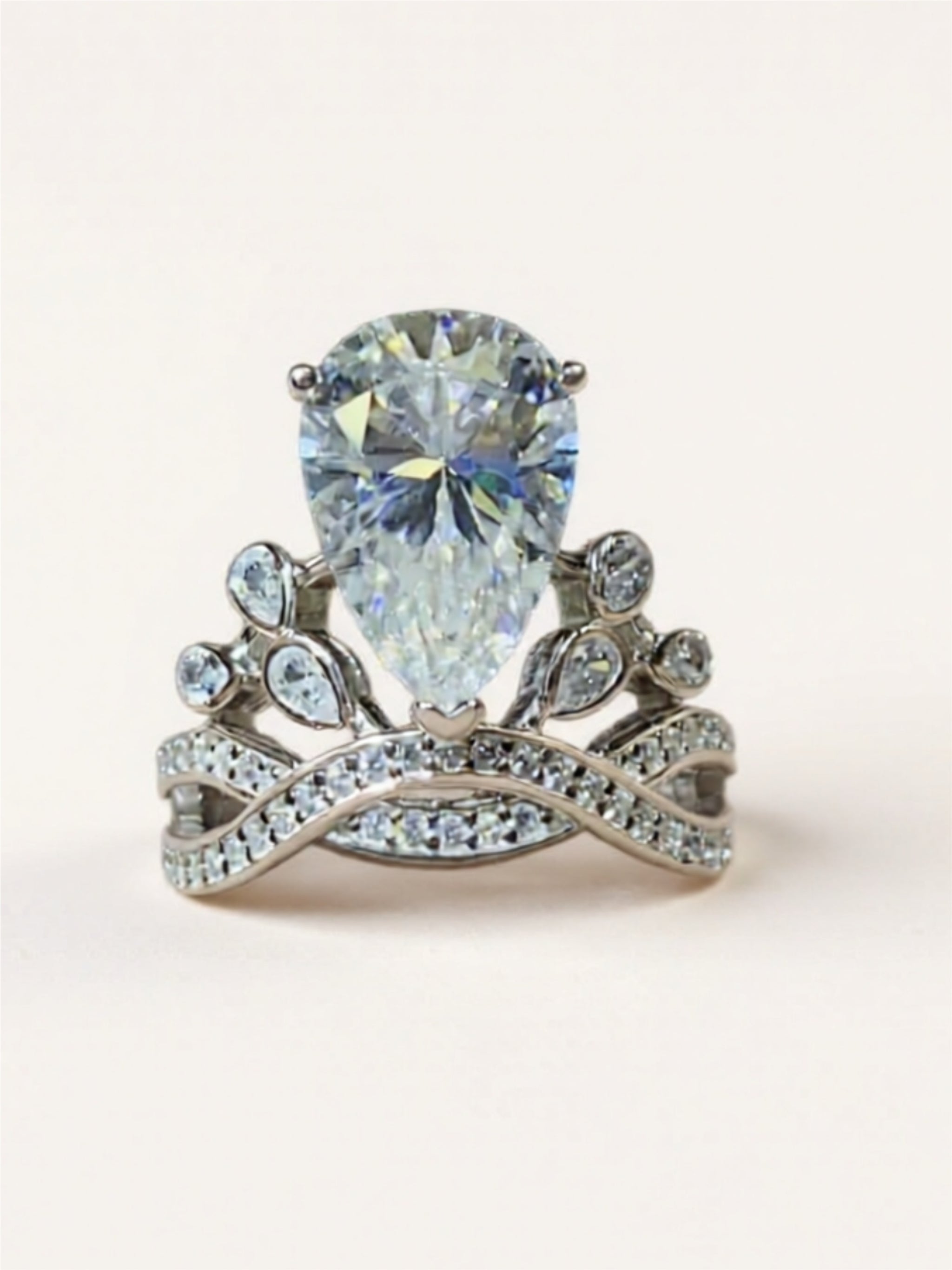 Sterling Silver Ring with 5-Carat Pear-Shaped Moissanite & CZ Accents