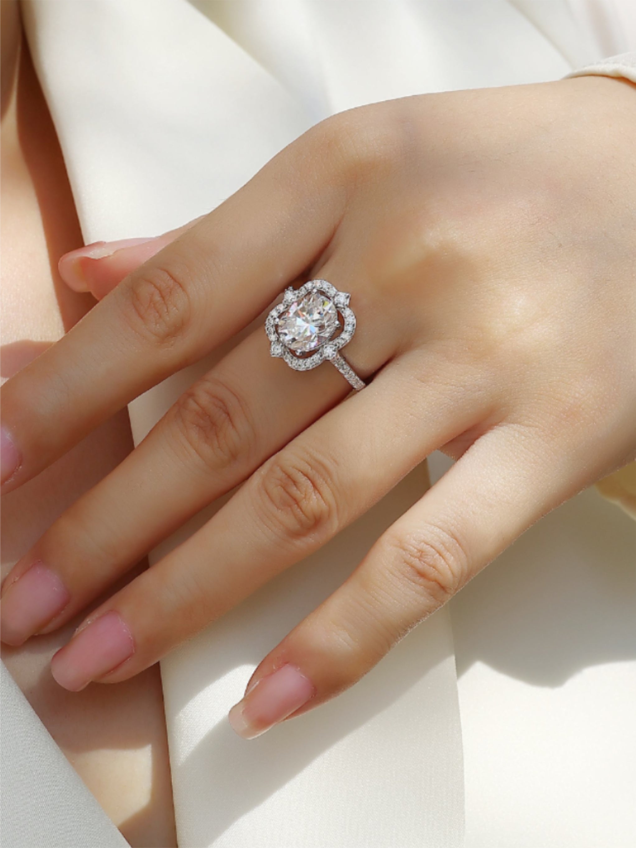 Egg‑Shaped Moissanite Halo Engagement Ring
