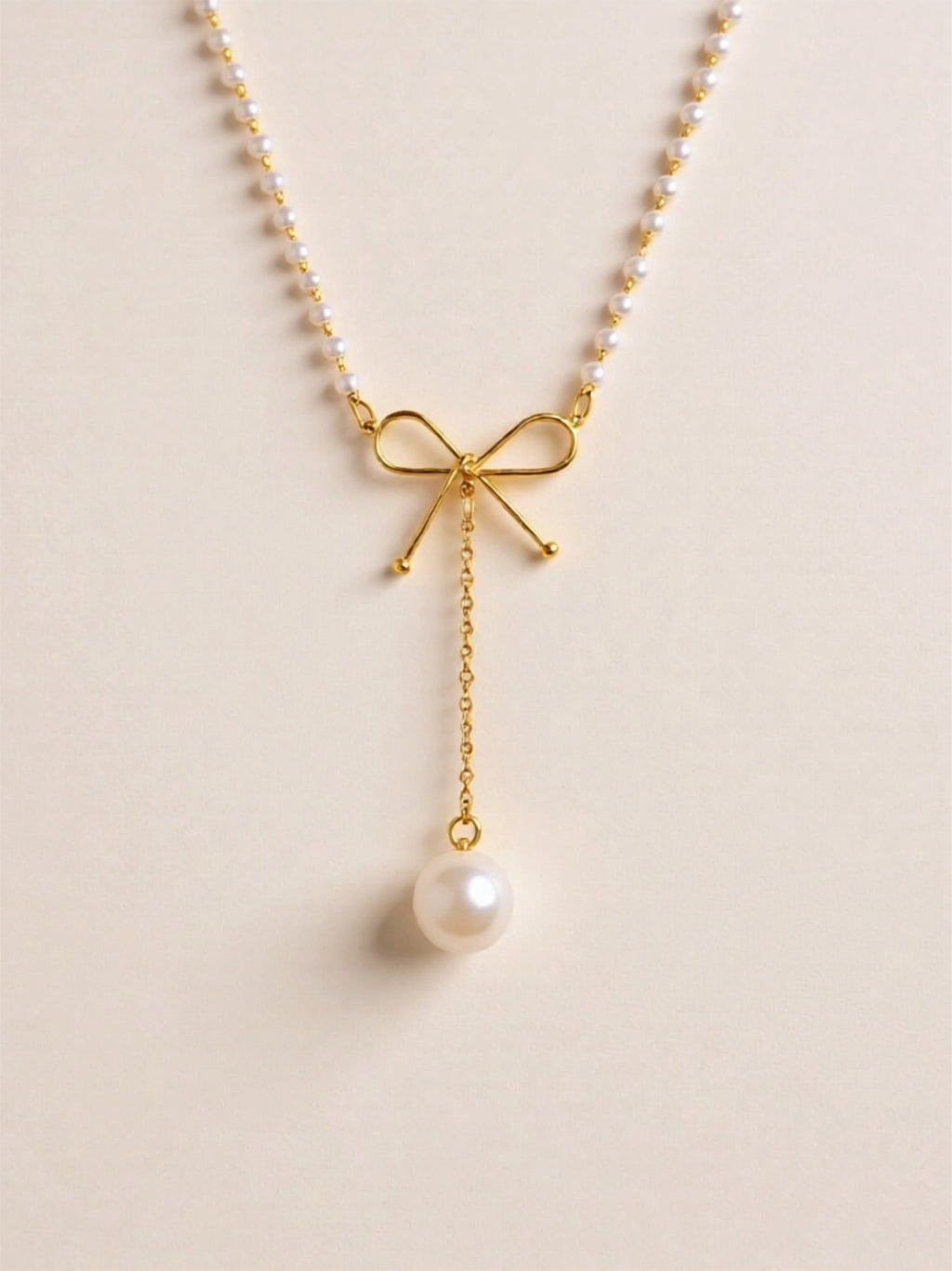 Stainless Steel Bow Pendant Necklace with Pearls